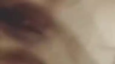 Risque Indian babe takes breasts and pussy out in a short porn video