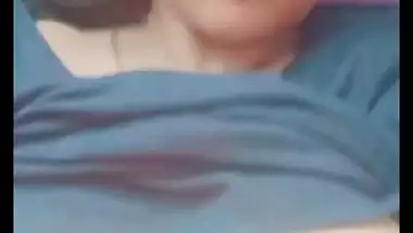 Bhabhi in glasses goes naked and fingers cunt