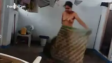 Desi is caught on the XXX camera exposing her sex boobies in bathroom