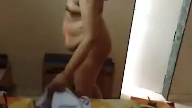 Paunchy Desi woman with small tits shows her body in the porn video