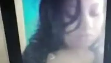 During video chat Desi gal reluctantly flashes BF her medium XXX tits