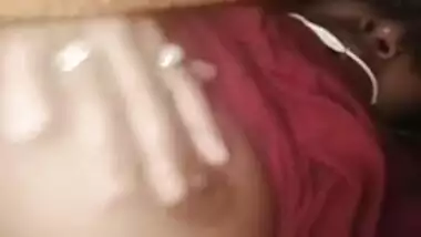 Lecherous Desi gal demonstrating her tits online under the blanket