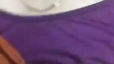 Slender Desi sexpot provocatively flashes small XXX tits on camera